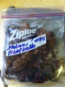 Decide what your family size portion should be.  Remove as much air as possible without squishing the meatballs.  Label and date the package.  Pop in the freezer for a quick week night meal!