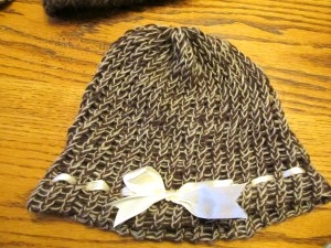 Alpaca loom knitted hat with ribbon trim